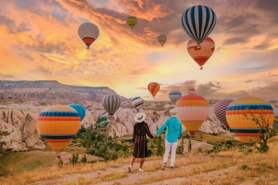 Watching the sunrise in a hot air balloon in Cappadocia.